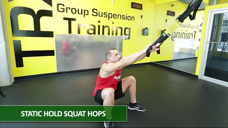 Static hold squat hops - TRX leg exercises